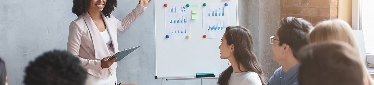 Women presenting at business meetings